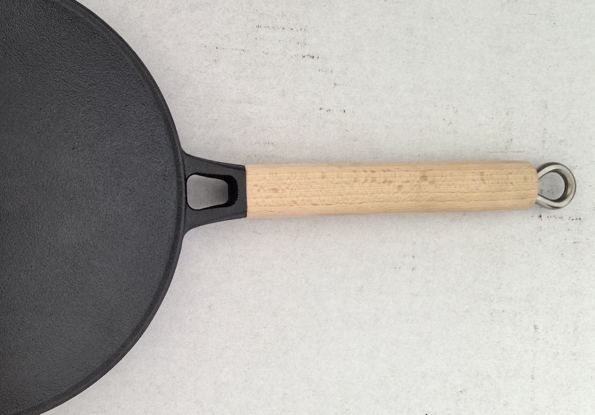 cast iron pan's wooden handle